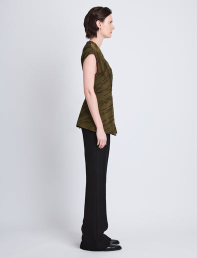 Side full length image of model wearing Stella Top in OLIVE MULTI