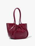 Side image of Large Puffy Nappa Ruched Tote in GARNET