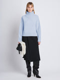 Front image of model wearing Alma Sweater In Lofty Eco Cashmere in pale blue