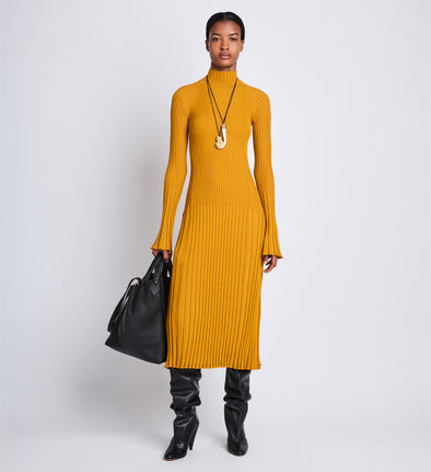 Front image of model wearing Carmen Dress In Midweight Viscose Rib in gold