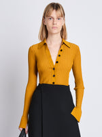 Cropped front image of model wearing Carla Sweater In Midweight Viscose Rib in gold