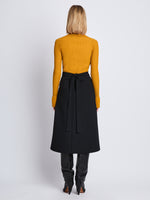 Back image of model wearing Carla Sweater In Midweight Viscose Rib in gold