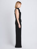Side image of model wearing Faye Backless Twist Back Dress In Velvet in black
