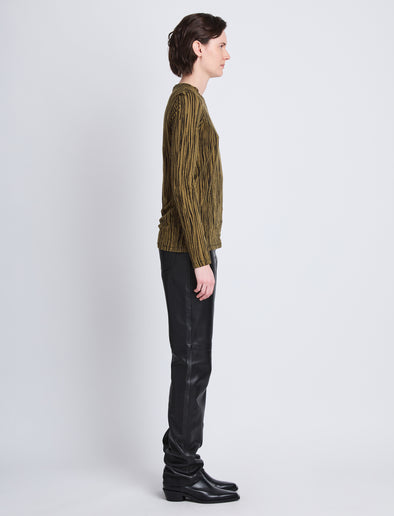 Side full length image of model wearing Mia T-Shirt In Printed Tissue Jersey in OLIVE MULTI