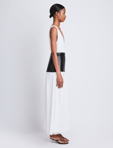 Side full length image of model wearing Viviane Dress in OFF WHITE