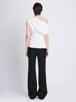 Back full length image of model wearing Francesa Off The Shoulder Top in WHITE