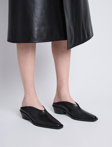 Image of model wearing Bronco Mules in BLACK