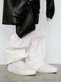 Image of model wearing Vans x Proenza Schouler Puffy Slip-On Shoes in ecru