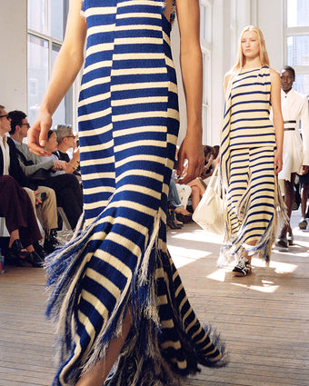 Models walking Proenza Schouler Spring Summer 2025 Runway wearing the Yves Dress in Stripe Fringed Knit and Yves Top and Skirt in Stripe Fringed Knit