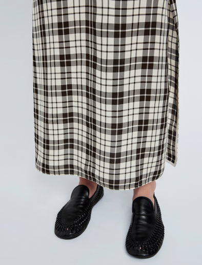 Proenza Schouler detail image of model wearing Hallie Dress in Crinkled Plaid in bark multi