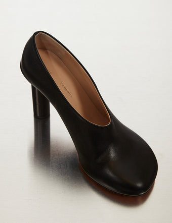 Black Glove Pumps on metallic backdrop