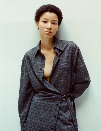 Model in Plaid Suiting Wrap Dress in off white/black/citron
