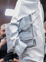 Image of model walking Proenza Schouler Fall Winter 2024 Runway wearing Split Tote in light grey