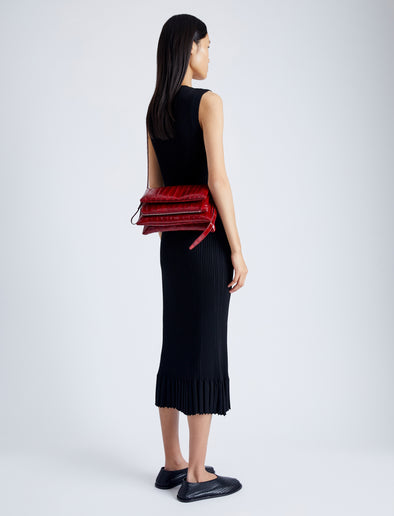 Image of model wearing City Bag in Eel in ROSEWOOD