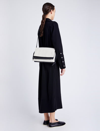 Image of model wearing City Bag in black/natural