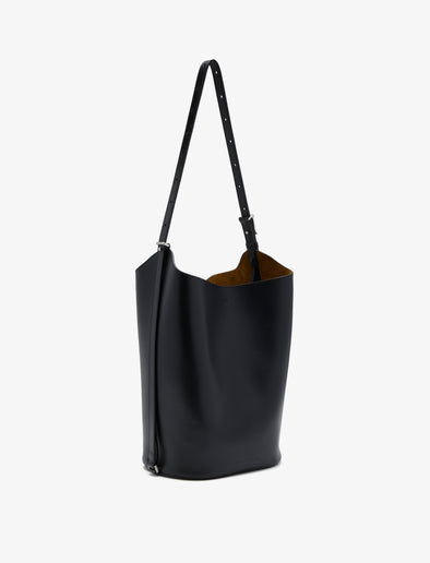 Proenza Schouler side image of Brant Bucket Bag in Smooth Calf in black