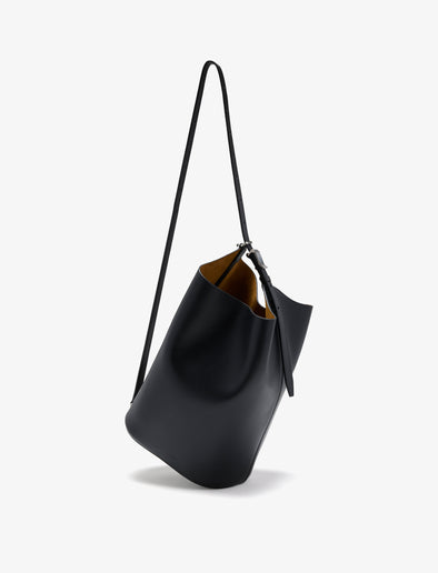 Proenza Schouler crossbody image of Brant Bucket Bag in Smooth Calf in black