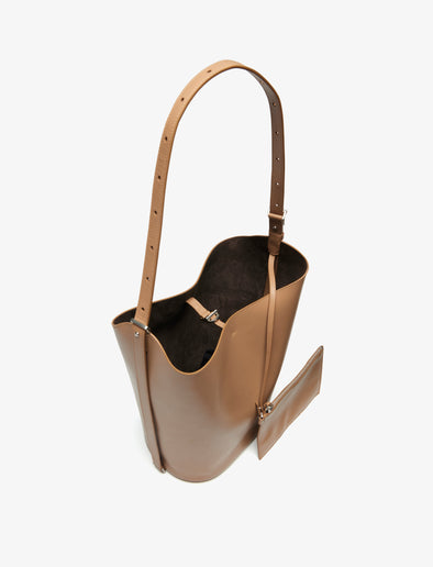 Aerial image of Brant Bucket Bag in Smooth Calf in Cumin