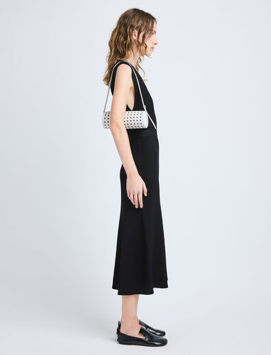 Image of model wearing Silo Bag in Eyelet Covered Nappa in Optic White