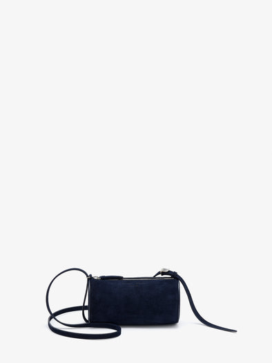 Front image of Crossbody Silo Bag in Deep Navy with strap folded down