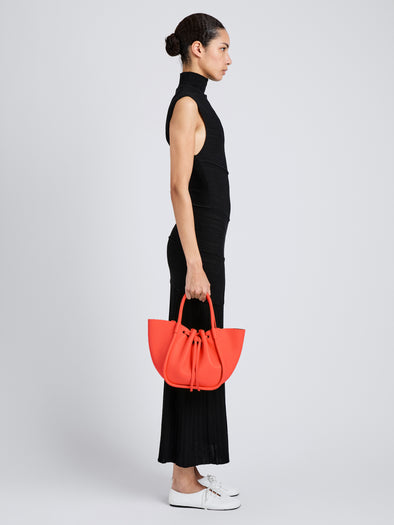 Proenza Schouler Image of model wearing Small Ruched Tote in Vermillion