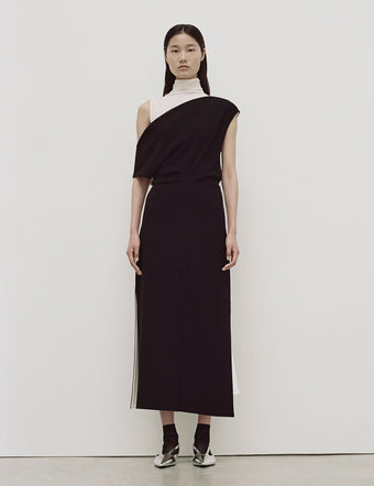 Model in Rosa Dress in Matte Viscose Crepe in black with white turtleneck layered underneath