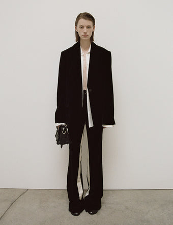 Model in Nico Tuxedo Jacket and Marie Tuxedo Pant in black Velvet Suiting