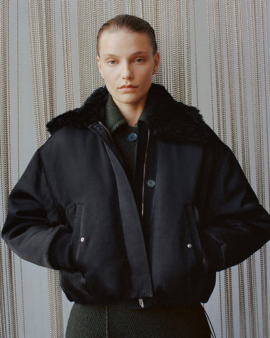 Proenza Schouler Front cropped image of model wearing Vadra Jacket in Recycled Nylon Twill in Black