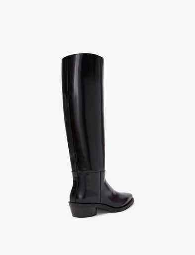 Proenza Schouler back 3/4 image of Bronco Knee High Boots in Spazzolato Leather in black