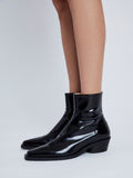 Image of model wearing Bronco Ankle Boots in Brushed Calf in black