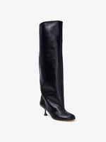 Front 3/4 image of Tee Knee High Boots in black