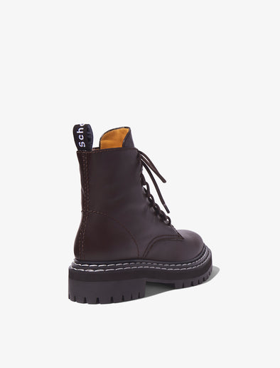 Proenza Schouler back 3/4 image of combat boots in black