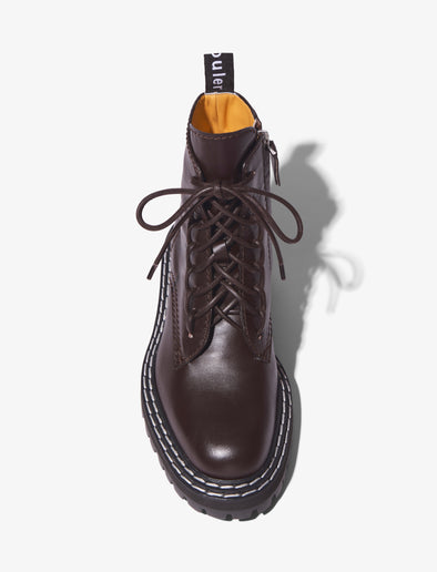 Aerial image of combat boots in black