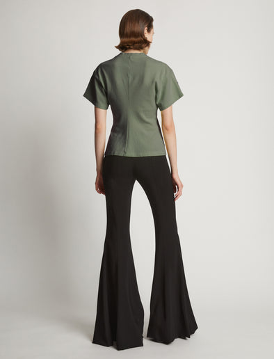 Proenza Schouler Back full length image of model wearing Eco Cotton Waisted T-Shirt in Sage