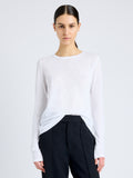 Proenza Schouler Front cropped image of model wearing Solid Tissue Jersey Long Sleeve Tee in WHITE