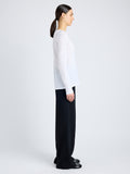 Proenza Schouler Side image of model wearing Solid Tissue Jersey Long Sleeve Tee in WHITE