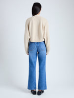 Back image of model wearing Eco Cashmere Cardigan in OATMEAL