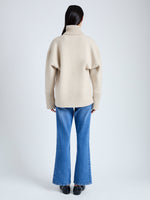 Back image of model wearing Doubleface Eco Cashmere Oversized Turtleneck Sweater in OATMEAL