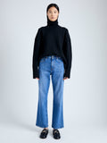Front image of model wearing Doubleface Eco Cashmere Oversized Turtleneck Sweater in BLACK