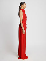 Side image of model wearing Faye Backless Dress In Matte Viscose Crepe in red
