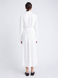 Back image of model wearing Vanessa Dress in Matte Viscose Crepe in white