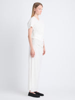 Side image of model in Sidney Dress In Silk Viscose in off white