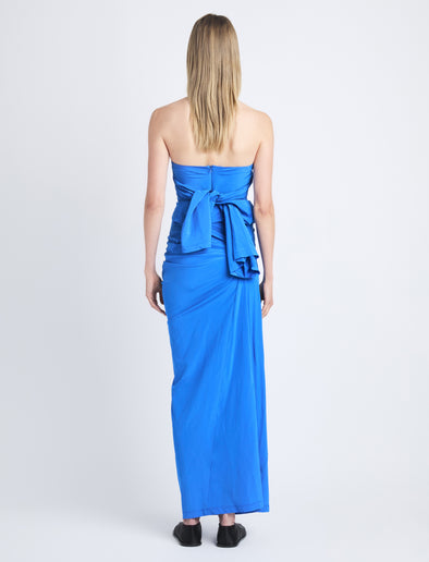 Back image of model wearing Odette Strapless Dress In Silk Viscose in cerulean