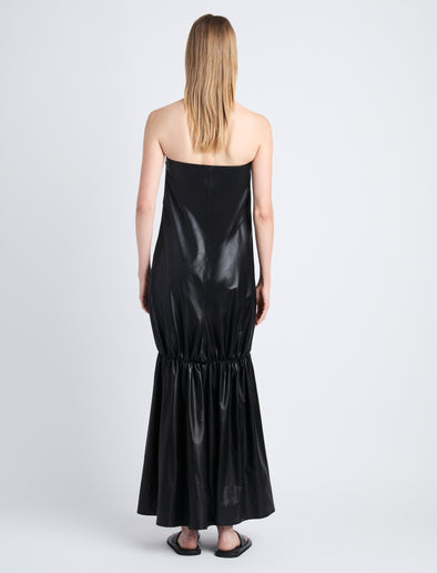 Back image of model in Margot Dress In Glossy Leather in black