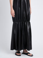 Detail image of model in Margot Dress In Glossy Leather in black