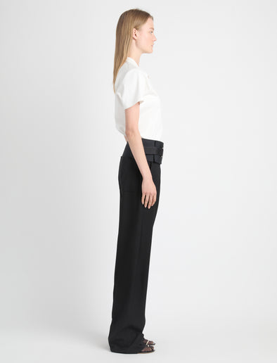 Side image of model in Talia V-Neck Top In Eco Cotton Jersey in white