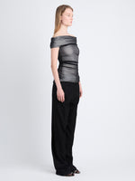 Side full length image of model wearing Allegra Top In Silk Nylon in BLACK