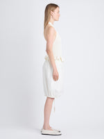 Side full length image of model wearing Hayley Skirt In Ligthweight Crinkle Poplin in OFF WHITE
