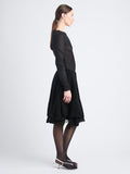 Side image of model wearing Julia Skirt In Micro Pleat Jersey in black