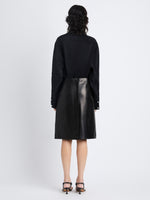 Back image of model wearing Adele Skirt In Leather in black